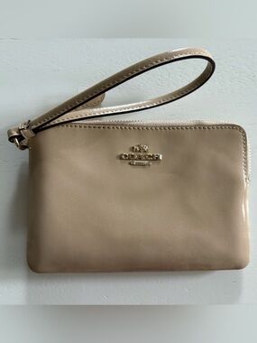 Coach Glossy Patent Leather Wristlet in Beige